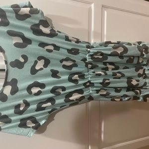 NWOT romper. Bought from discount divas boutique. Never wore. Size small